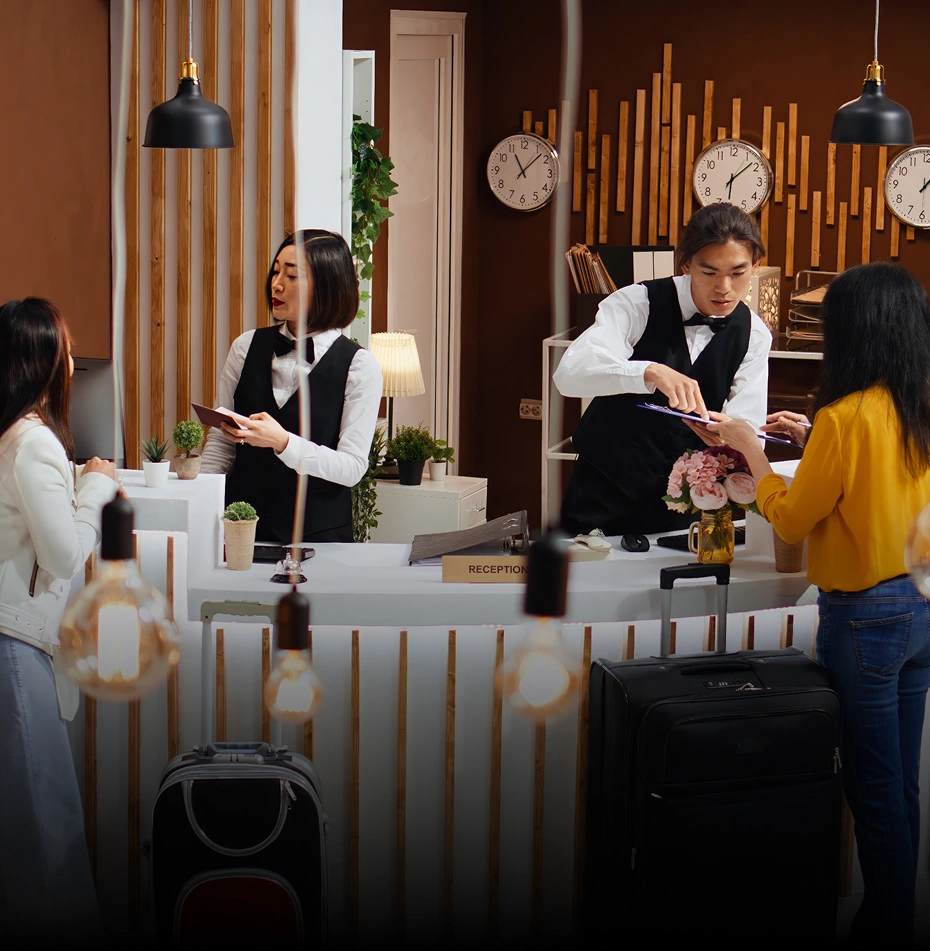Hospitality staff serving food and drinks in a restaurant, highlighting customer service and dining experience.