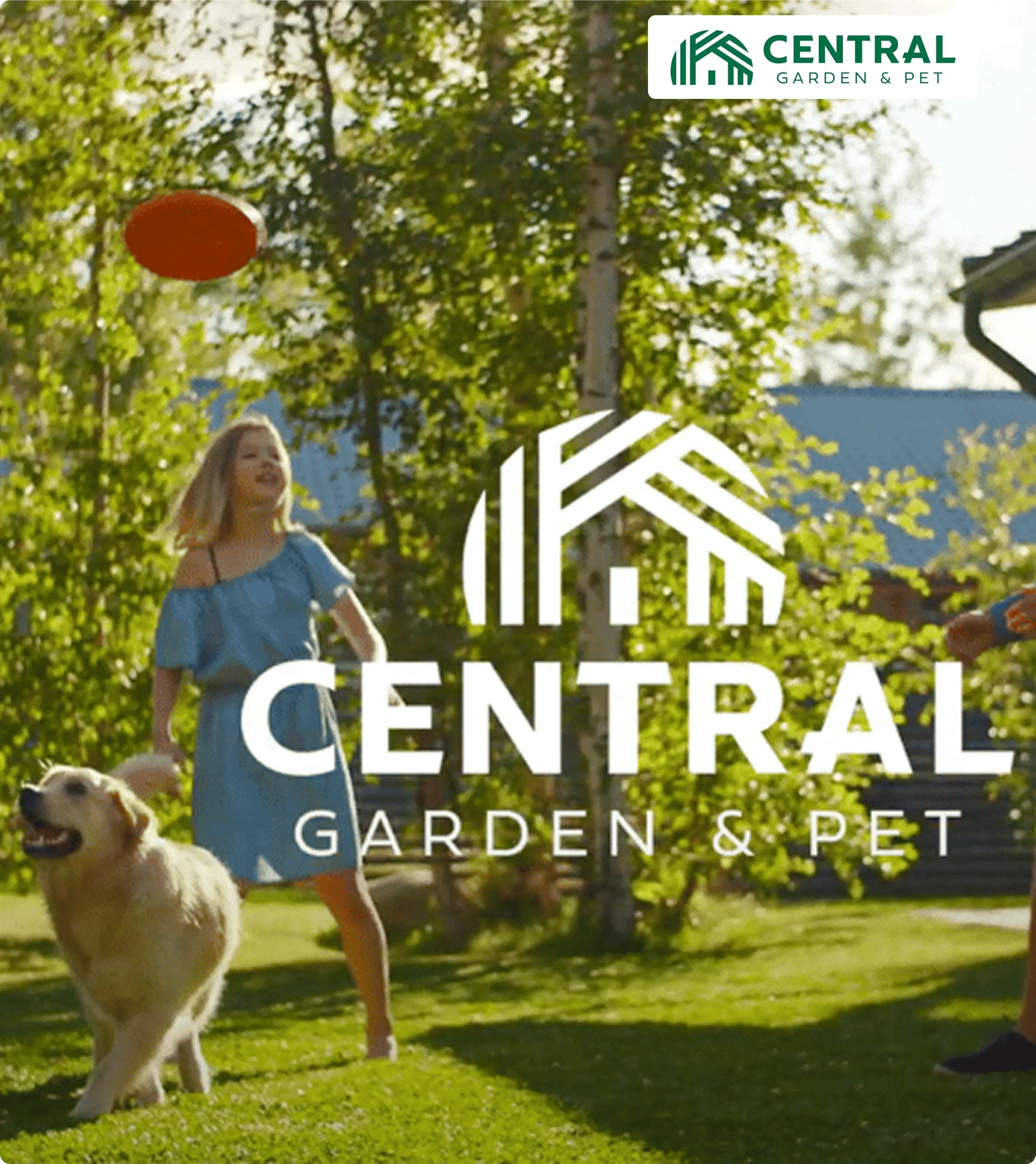 A woman in a blue dress joyfully throws a frisbee for her golden retriever in a sunlit garden, with the Central Garden & Pet logo overlaid.